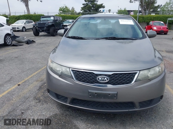 2012 Kia Forte EX with VIN KNAFU4A2XC5560585, listed as a IAAI auction lot 42121133 with 151,079 mi miles. Bid and sale history available at carsss.com. Image 12.