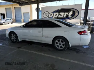 1999 Toyota Solara SE z VIN 2T1CF22P4XC171139, wystawiony jako Copart lot #58728195 z przebiegiem 148 703 mil mil oraz Szkody całkowita. Historia ofert i sprzedaży dostępna na DreamBid. Obrazek 2.