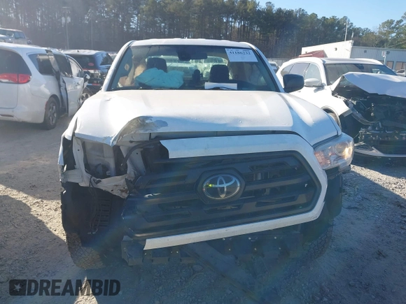 2018 Toyota Tacoma SR with VIN 5TFRX5GN9JX121099, listed as a IAAI auction lot 41186232 with 127,151 mi miles and . Bid and sale history available at DreamBid. Image 12.