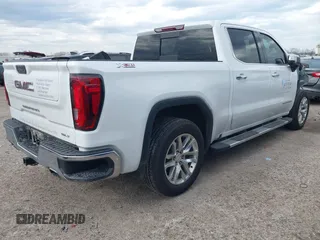 2020 GMC Sierra 1500 SLT z VIN 3GTU9DED1LG451500, wystawiony jako IAAI lot #41351345 z przebiegiem 53 576 mil mil oraz . Historia ofert i sprzedaży dostępna na DreamBid. Obrazek 4.