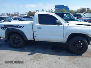 2014 Toyota Tacoma with VIN 5TFNX4CN7EX041191, listed as a IAAI auction lot 42141570 with 227,969 mi miles and . Bid and sale history available at DreamBid. Image 14.