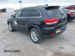 2018 Jeep Grand Cherokee Laredo E with VIN 1C4RJFAG6JC335606, listed as a IAAI auction lot 42280666 with 113,438 mi miles and . Bid and sale history available at DreamBid. Image 3.