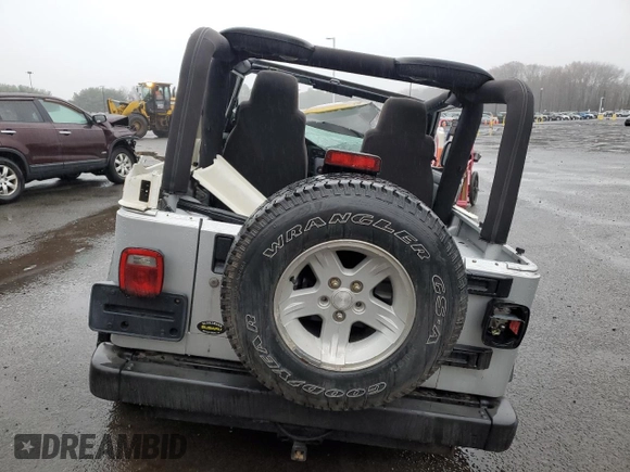 2004 Jeep Wrangler Sport with VIN 1J4FA49S64P767393, listed as a Copart auction lot 51662605 with 165,942 mi miles and Salvage Title. Bid and sale history available at carsss.com. Image 6.