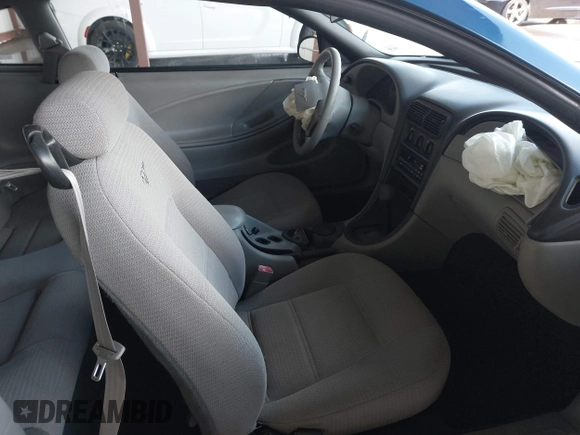 1999 Ford Mustang with VIN 1FAFP4040XF124637, listed as a IAAI auction lot 41793662 with 54,591 mi miles and . Bid and sale history available at DreamBid. Image 5.