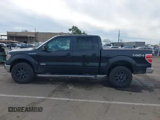 2013 Ford F-150 XL with VIN 1FTFW1ET3DFA74856, listed as a IAAI auction lot 41656892 with 171,992 mi miles. Bid and sale history available at carsss.com. Image 14.