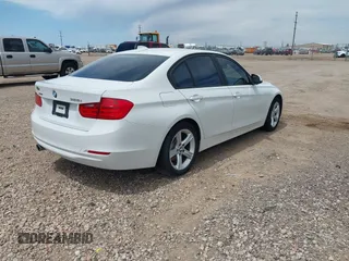2015 BMW 3 Series 328i xDrive with VIN WBA3B3C56FJ984660, listed as a IAAI auction lot 42046128 with Not provided miles and . Bid and sale history available at DreamBid. Image 4.