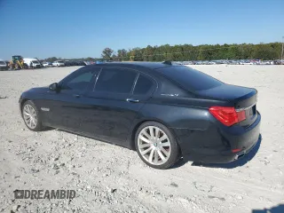 2011 BMW 7 Series with VIN WBAKX8C55BC198177, listed as a Copart auction lot 77016924 with 99,275 mi miles and Salvage title. Bid and sale history available at DreamBid. Image 2.