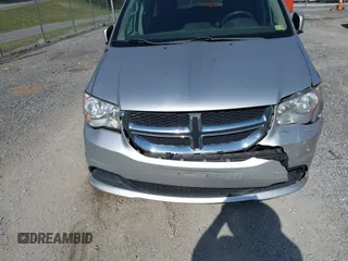 2012 Dodge Grand Caravan SXT with VIN 2C4RDGCG0CR284124, listed as a IAAI auction lot 42103224 with 131,691 mi miles and . Bid and sale history available at DreamBid. Image 6.