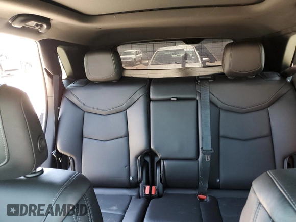 2023 Cadillac XT5 FWD Premium Luxury z VIN 1GYKNCRS0PZ173923, wystawiony jako Copart lot #52212695 z przebiegiem Nie podano mil oraz Szkoda całkowita • Salvage title. Historia ofert i sprzedaży dostępna na DreamBid. Obrazek 10.