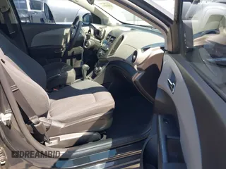 2014 Chevrolet Sonic LT with VIN 1G1JC5SB7E4146444, listed as a IAAI auction lot 42014386 with 85,122 mi miles and . Bid and sale history available at DreamBid. Image 5.