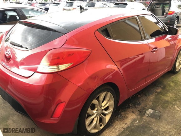 2015 Hyundai Veloster with VIN KMHTC6AD0FU238274, listed as a Copart auction lot 73207244 with 143,112 mi miles and Clean Title. Bid and sale history available at carsss.com. Image 4.