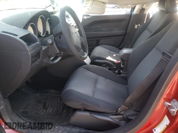2009 Dodge Caliber SXT with VIN 1B3HB48A69D150199, listed as a Copart auction lot 51043165 with 218,125 mi miles and Clean Title. Bid and sale history available at DreamBid. Image 7.