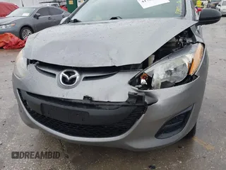 2013 Mazda Mazda2 Sport with VIN JM1DE1KY6D0170767, listed as a IAAI auction lot 41761689 with 142,743 mi miles. Bid and sale history available at carsss.com. Image 6.