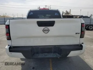 2022 Nissan Frontier SV with VIN 1N6ED1EJ2NN646598, listed as a Copart auction lot 58439325 with 56,882 mi miles and Salvage title. Bid and sale history available at DreamBid. Image 6.