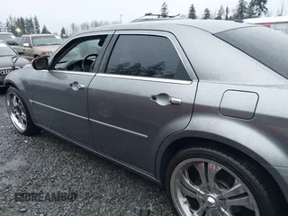 2006 Chrysler 300 C with VIN 2C3KA63H06H286676, listed as a IAAI auction lot 41231230 with 134,565 mi miles. Bid and sale history available at carsss.com. Image 14.