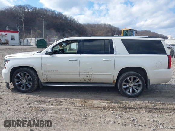 2015 Chevrolet Suburban LTZ with VIN 1GNSKKKC4FR304532, listed as a IAAI auction lot 41899860 with 123,624 mi miles. Bid and sale history available at carsss.com. Image 14.