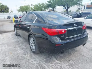 2015 Infiniti Q50 Premium with VIN JN1BV7AR9FM415466, listed as a IAAI auction lot 41960277 with 164,446 mi miles. Bid and sale history available at carsss.com. Image 3.