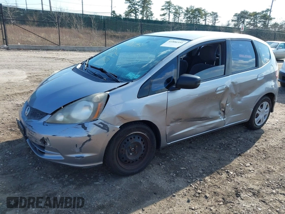 2009 Honda Fit with VIN JHMGE88279S064850, listed as a IAAI auction lot 41886951 with 185,580 mi miles. Bid and sale history available at carsss.com. Image 2.