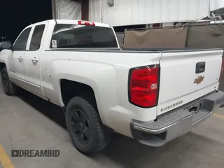 2018 Chevrolet Silverado 1500 LT with VIN 1GCRCREHXJZ288155, listed as a IAAI auction lot 41959980 with 114,919 mi miles and . Bid and sale history available at DreamBid. Image 3.