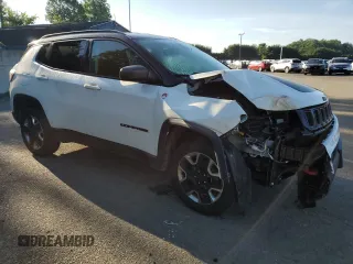 2018 Jeep Compass Trailhawk with VIN 3C4NJDDB9JT451745, listed as a Copart auction lot 61187255 with 88,923 mi miles and Salvage title. Bid and sale history available at DreamBid. Image 4.