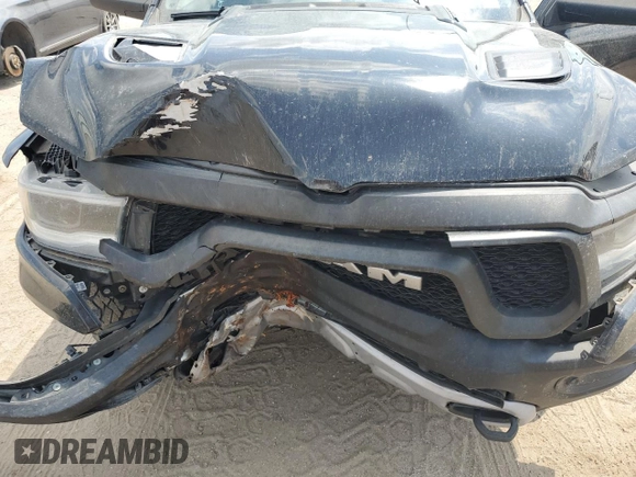 2019 Ram 1500 Rebel z VIN 1C6SRFLT8KN618140, wystawiony jako Copart lot #54734815 z przebiegiem 145 040 mil mil oraz Szkoda całkowita • Salvage title. Historia ofert i sprzedaży dostępna na DreamBid. Obrazek 11.