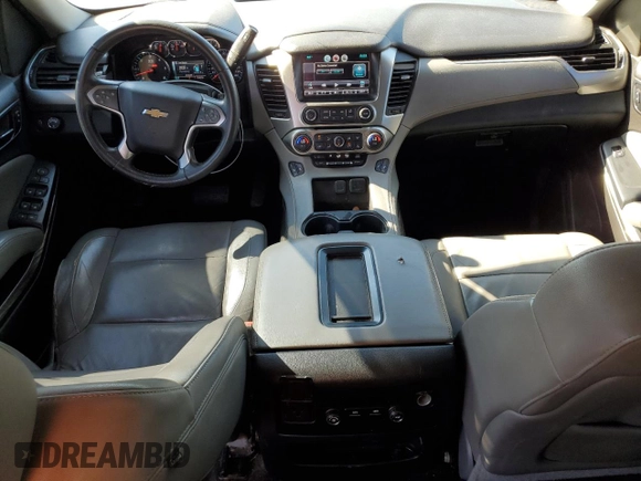 2015 Chevrolet Tahoe LT with VIN 1GNSCBKC0FR521749, listed as a Copart auction lot 50480075 with 156,940 mi miles and Salvage Title. Bid and sale history available at DreamBid. Image 8.