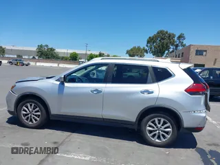 2017 Nissan Rogue S with VIN KNMAT2MT5HP588959, listed as a IAAI auction lot 39662668 with 224,444 mi miles and . Bid and sale history available at carsss.com. Image 14.