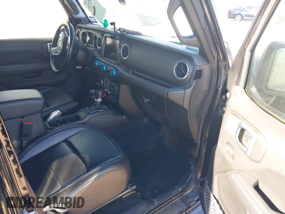 2021 Jeep Wrangler Unlimited Sahara z VIN 1C4JJXP68MW863698, wystawiony jako IAAI lot #41615738 z przebiegiem Nie podano mil oraz . Historia ofert i sprzedaży dostępna na DreamBid. Obrazek 5.