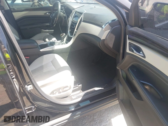2013 Cadillac SRX Premium Collection with VIN 3GYFNJE33DS560639, listed as a IAAI auction lot 42015863 with 161,270 mi miles and . Bid and sale history available at DreamBid. Image 5.