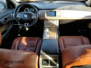 2009 Jaguar XF with VIN SAJWA07C991R41110, listed as a Copart auction lot 73204964 with 147,727 mi miles and Salvage Title. Bid and sale history available at DreamBid. Image 8.