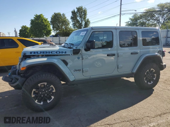 2024 Jeep Wrangler Rubicon z VIN 1C4RJXR64RW279791, wystawiony jako Copart lot #61348324 z przebiegiem 1 387 mil mil oraz Szkoda całkowita • Salvage title. Historia ofert i sprzedaży dostępna na DreamBid. Obrazek 1.