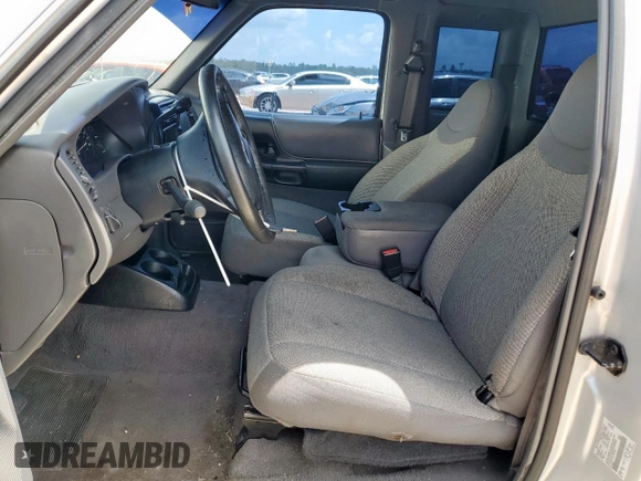 2001 Ford Ranger XL with VIN 1FTYR14V01PB46542, listed as a Copart auction lot 60977205 with 230,933 mi miles and Salvage title. Bid and sale history available at DreamBid. Image 7.