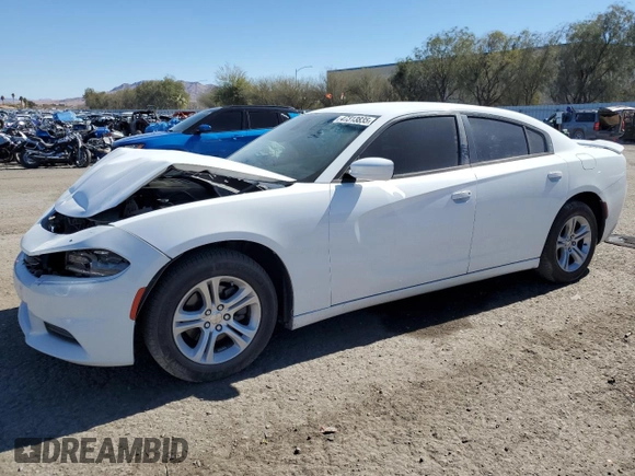 2015 Dodge Charger SE with VIN 2C3CDXBG2FH867283, listed as a Copart auction lot 47313835 with 124,448 mi miles and Salvage Title. Bid and sale history available at carsss.com. Image 1.
