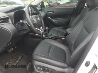 2023 Toyota Corolla Cross XLE with VIN 7MUDAABG3PV044005, listed as a Copart auction lot 54955225 with 50,712 mi miles and Salvage title. Bid and sale history available at DreamBid. Image 7.