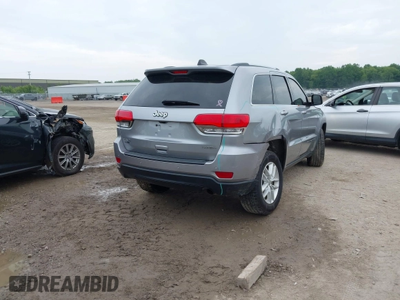 2017 Jeep Grand Cherokee Laredo with VIN 1C4RJFAG3HC963309, listed as a IAAI auction lot 42501394 with 145,315 mi miles and . Bid and sale history available at DreamBid. Image 4.
