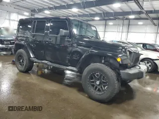 2012 Jeep Wrangler Unlimited Sahara with VIN 1C4BJWEG8CL235893, listed as a Copart auction lot 58195585 with 142,179 mi miles and Salvage title. Bid and sale history available at DreamBid. Image 4.