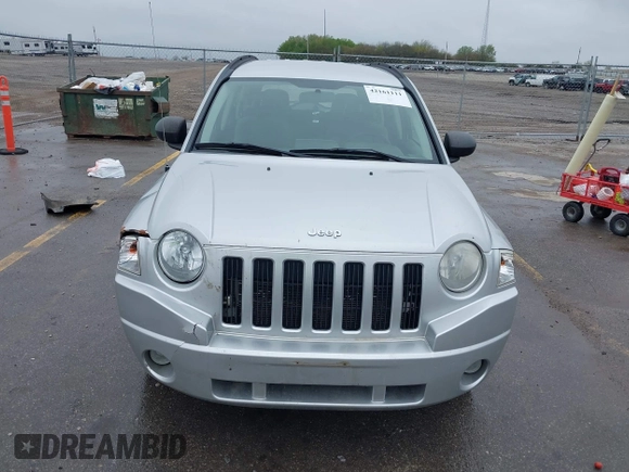 2007 Jeep Compass Sport with VIN 1J8FF47W77D278643, listed as a IAAI auction lot 42161111 with 164,805 mi miles and . Bid and sale history available at carsss.com. Image 6.