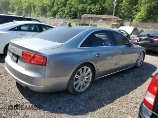 2012 Audi A8 z VIN WAURVAFDXCN001167, wystawiony jako Copart lot #57227105 z przebiegiem 154 409 mil mil oraz Szkoda całkowita • Salvage title. Historia ofert i sprzedaży dostępna na DreamBid. Obrazek 3.