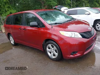 2014 Toyota Sienna L with VIN 5TDZK3DC0ES457242, listed as a IAAI auction lot 42307360 with 86,857 mi miles and . Bid and sale history available at DreamBid. Image 1.