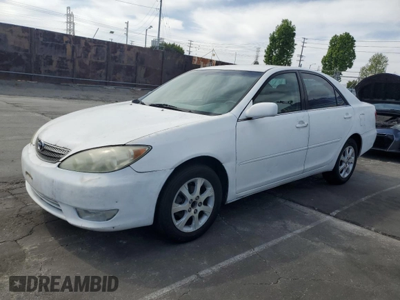 2004 Toyota Camry LE with VIN 4T1BE32KX4U379593, listed as a Copart auction lot 53391455 with 221,056 mi miles and Salvage Title. Bid and sale history available at carsss.com. Image 1.