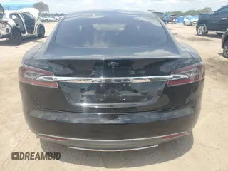 2014 Tesla Model S 60 with VIN 5YJSA1S16EFP50982, listed as a Copart auction lot 54426015 with 76,515 mi miles and Salvage title. Bid and sale history available at DreamBid. Image 6.