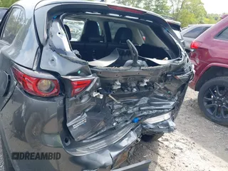 2020 Mazda CX-5 Grand Touring with VIN JM3KFBDM1L0821975, listed as a IAAI auction lot 40088794 with 68,895 mi miles and . Bid and sale history available at DreamBid. Image 12.