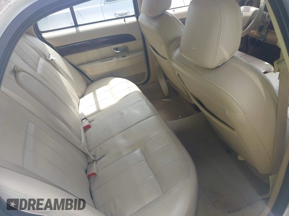 2008 Mercury Grand Marquis LS with VIN 2MEFM75VX8X600015, listed as a IAAI auction lot 42142359 with 310,481 mi miles and . Bid and sale history available at DreamBid. Image 8.