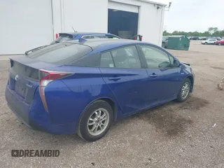 2016 Toyota Prius Two z VIN JTDKBRFU3G3511809, wystawiony jako IAAI lot #42295946 z przebiegiem 118 621 mil mil oraz . Historia ofert i sprzedaży dostępna na DreamBid. Obrazek 4.