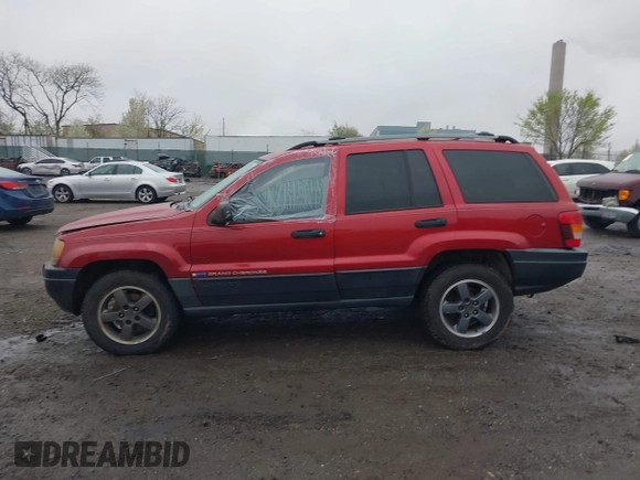 2004 Jeep Grand Cherokee Laredo with VIN 1J4GW48S94C151816, listed as a IAAI auction lot 41983332 with 151,227 mi miles. Bid and sale history available at carsss.com. Image 14.