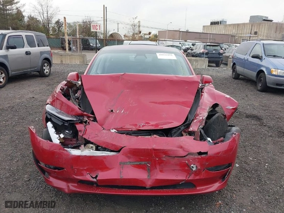 2018 Tesla Model 3 Long Range Battery with VIN 5YJ3E1EA4JF159743, listed as a IAAI auction lot 40839991 with 117,039 mi miles. Bid and sale history available at carsss.com. Image 6.