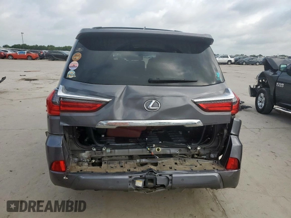 2017 Lexus LX 570 with VIN JTJHY7AX6H4237898, listed as a Copart auction lot 61805495 with 97,598 mi miles and Salvage title. Bid and sale history available at DreamBid. Image 6.