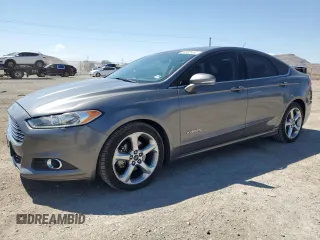 2014 Ford Fusion SE Hybrid with VIN 3FA6P0LU3ER306739, listed as a Copart auction lot 69887454 with 114,150 mi miles and Salvage title. Bid and sale history available at DreamBid. Image 1.
