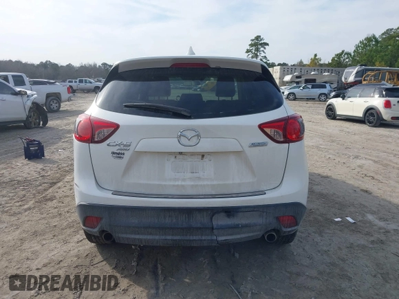 2014 Mazda CX-5 Grand Touring with VIN JM3KE4DY0E0343777, listed as a IAAI auction lot 41464395 with 126,214 mi miles. Bid and sale history available at carsss.com. Image 16.
