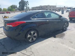 2013 Hyundai Elantra Coupe GS PZEV with VIN KMHDH6AE3DU006571, listed as a IAAI auction lot 42074843 with 161,612 mi miles. Bid and sale history available at carsss.com. Image 4.